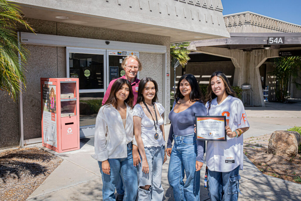 Southwestern College Professor Dr. Max Branscomb with the previous and current Sun Editor-in Chiefs Nicolette Monique Luna, Liliana Anguiano, Camila Gonzalez and Emily Ingco presenting their recent achievements in front of the Sun Newspaper. (left to right)